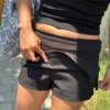 西裝布料低腰顯包臀裙褲A字短裙