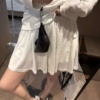 萊賽爾露背長袖短裙套裝