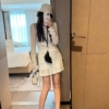 萊賽爾露背長袖短裙套裝