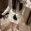 萊賽爾露背長袖短裙套裝