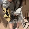萊賽爾露背長袖短裙套裝