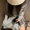 萊賽爾露背長袖短裙套裝