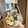 萊賽爾露背長袖短裙套裝
